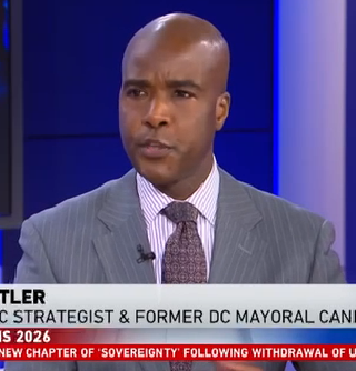 A moment from the conversation. James Butler shares his perspective on the political issues behind the headlines. cover